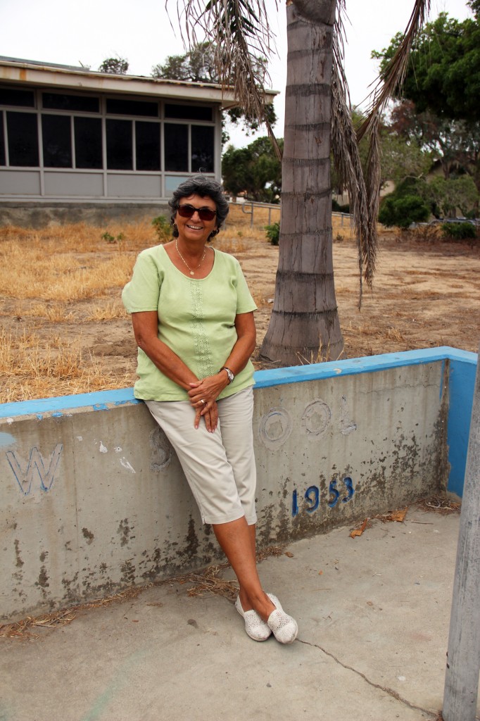 Encinitas City Councilmember rests in front of the now-dilapidated Pacific View school on June 30, 2014.