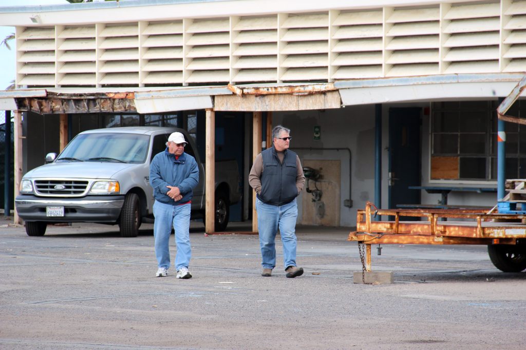Encinitas Chamber of Commerce CEO Bob Gattinella (left) and Encinitas City Councilmember Tony Kranz inspected the city's newly acquired Pacific View property on the morning of December 30, 2014. They discussed the condition and salvageability of the buildings, and informally brainstormed uses for them.